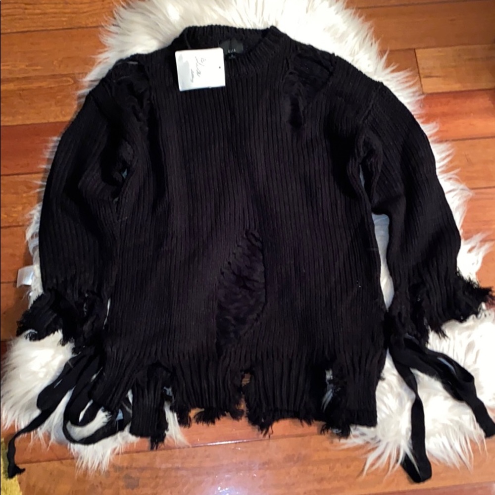 Black distressed ripped knit sweater